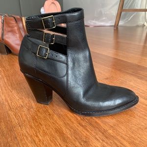 Black Cole Haan Booties with buckle accents